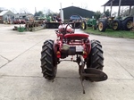 1949 International Farmall Super A with plow oldtimer tractor te koop